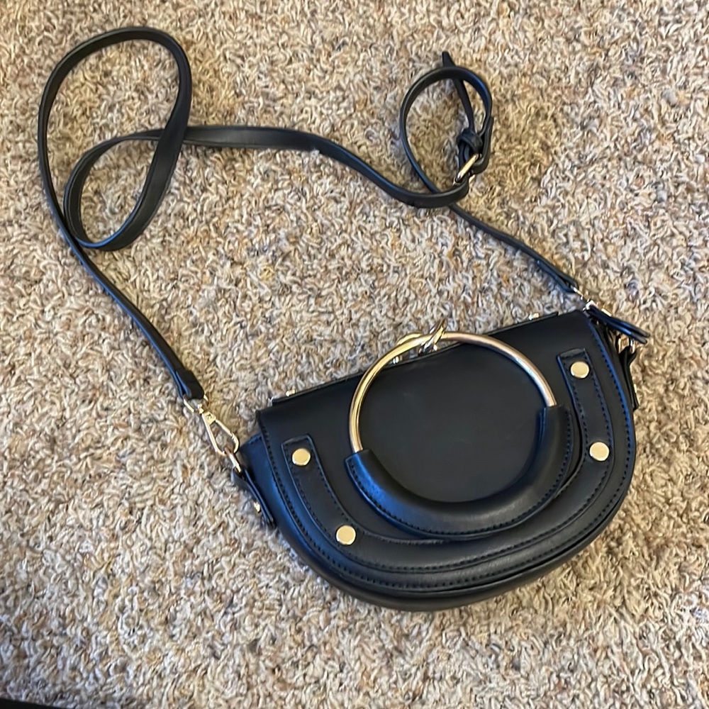 Black gold ring crossbody